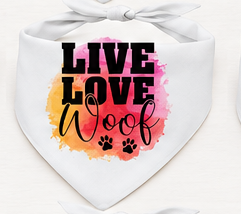 White bandana with 'Live Love Woof' text and paw prints on a colorful background